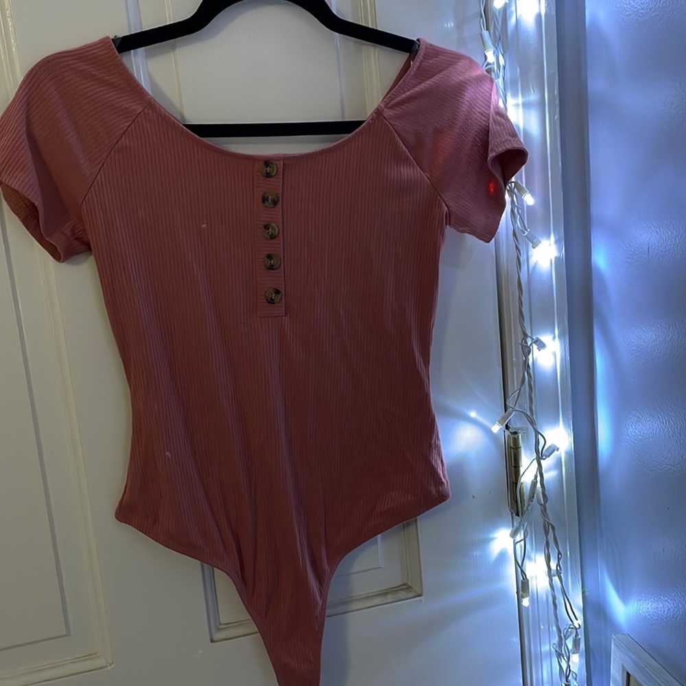Rose body suit.